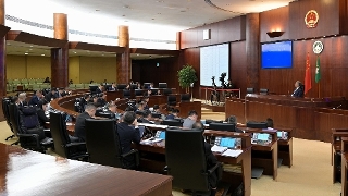 The Secretary for Social Affairs and Culture, Ms O Lam, attends a plenary session of the Legislative Assembly, which holds a first reading and a vote on a bill regarding a legal system for private education centres.