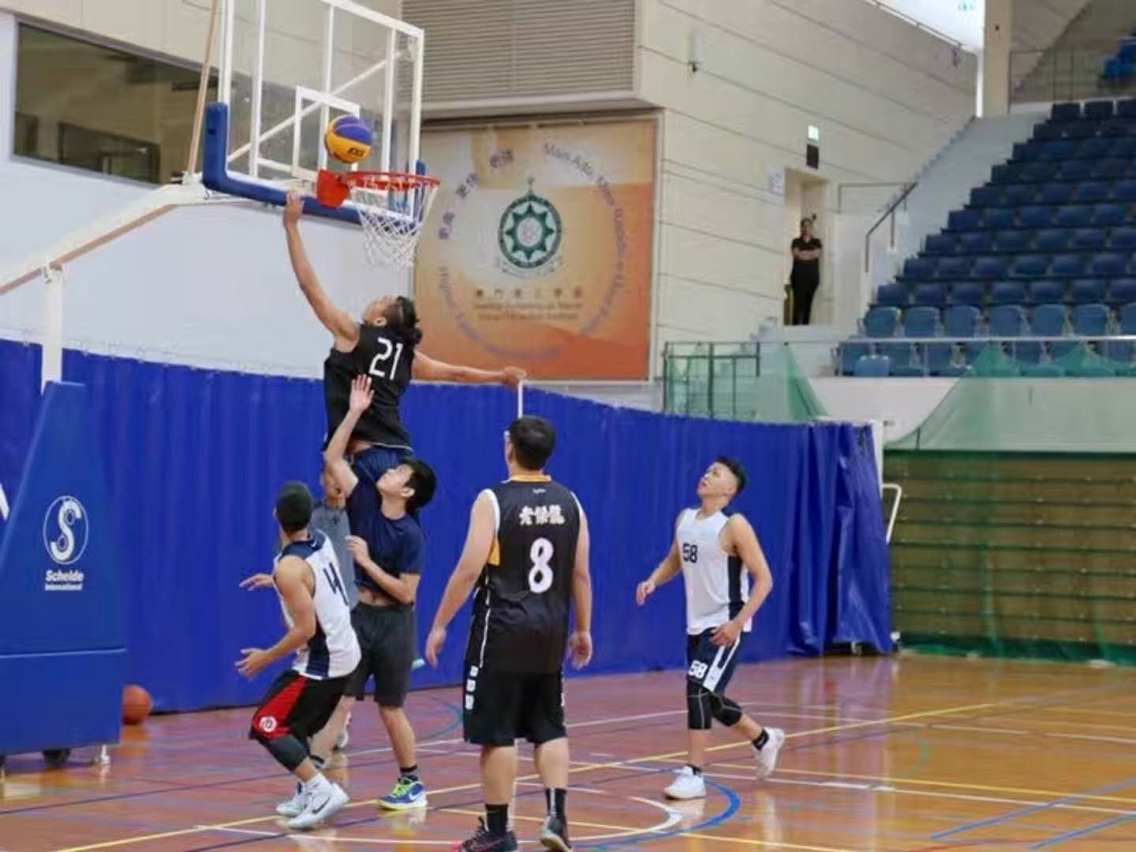A team competing in the male division delivering a brilliant layup
