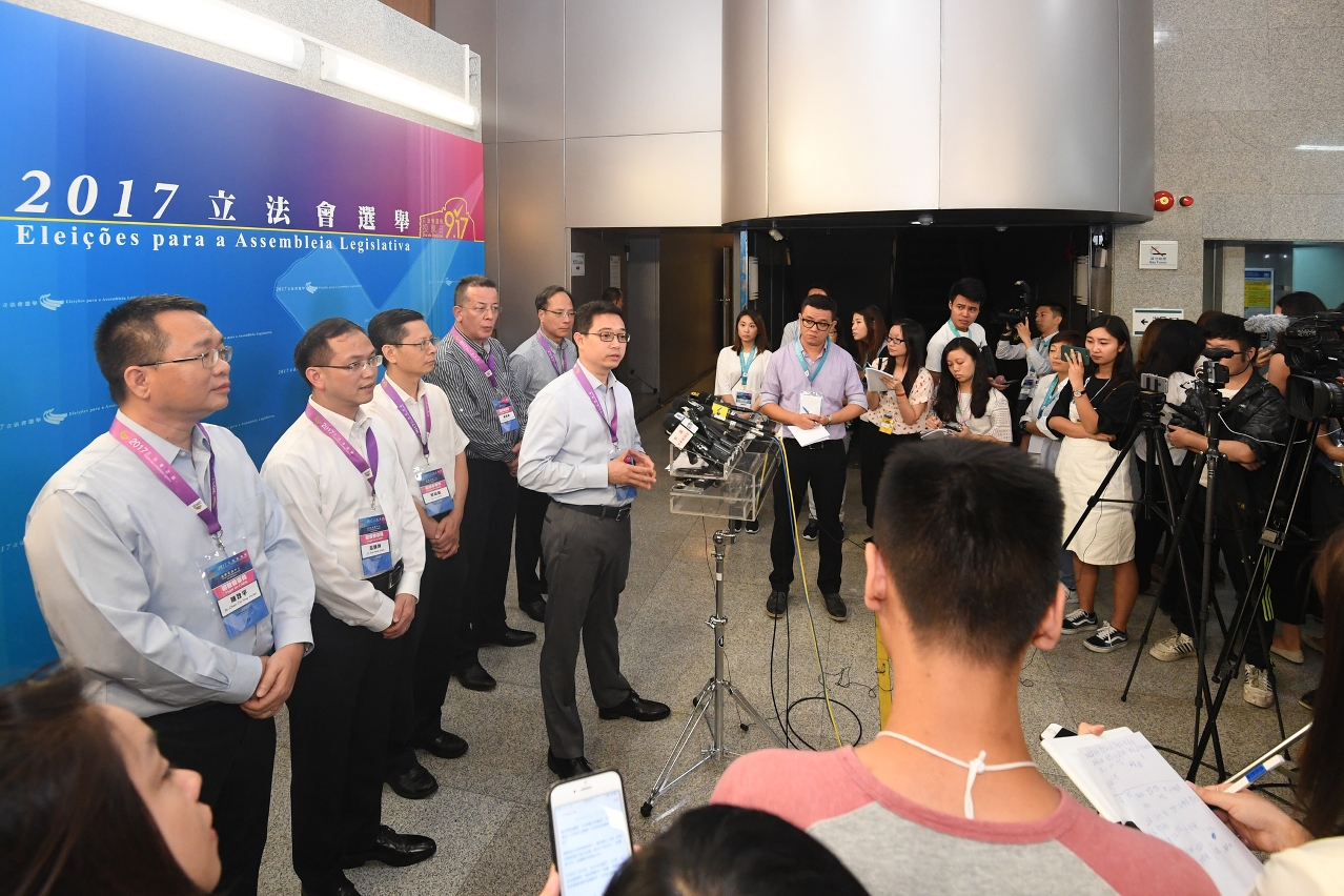 The Chairman of the Electoral Affairs Commission for the Legislative Assembly Election, Mr Tong Hio Fong, speaks to reporters after the polls closed.