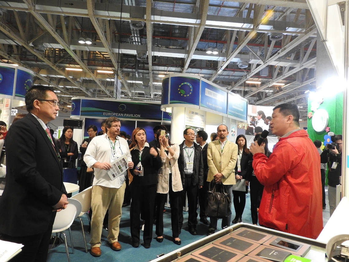 Exhibitors introduce their products to members of the guided tour.
