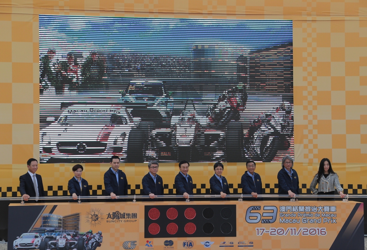 Members of the Macau Grand Prix Organizing Committee officially mark the start of Grand Prix week