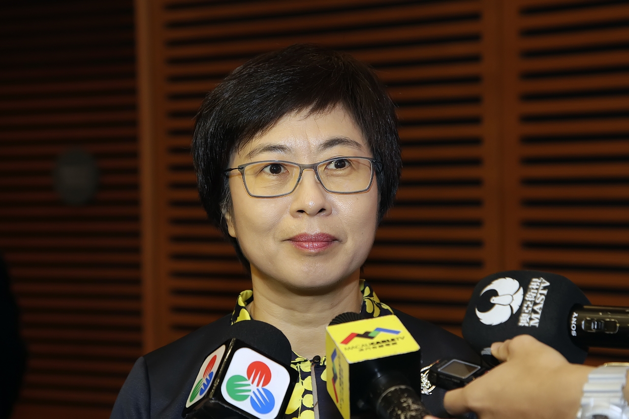 The Secretary for Administration and Justice, Ms Chan Hoi Fan, speaks to reporters.