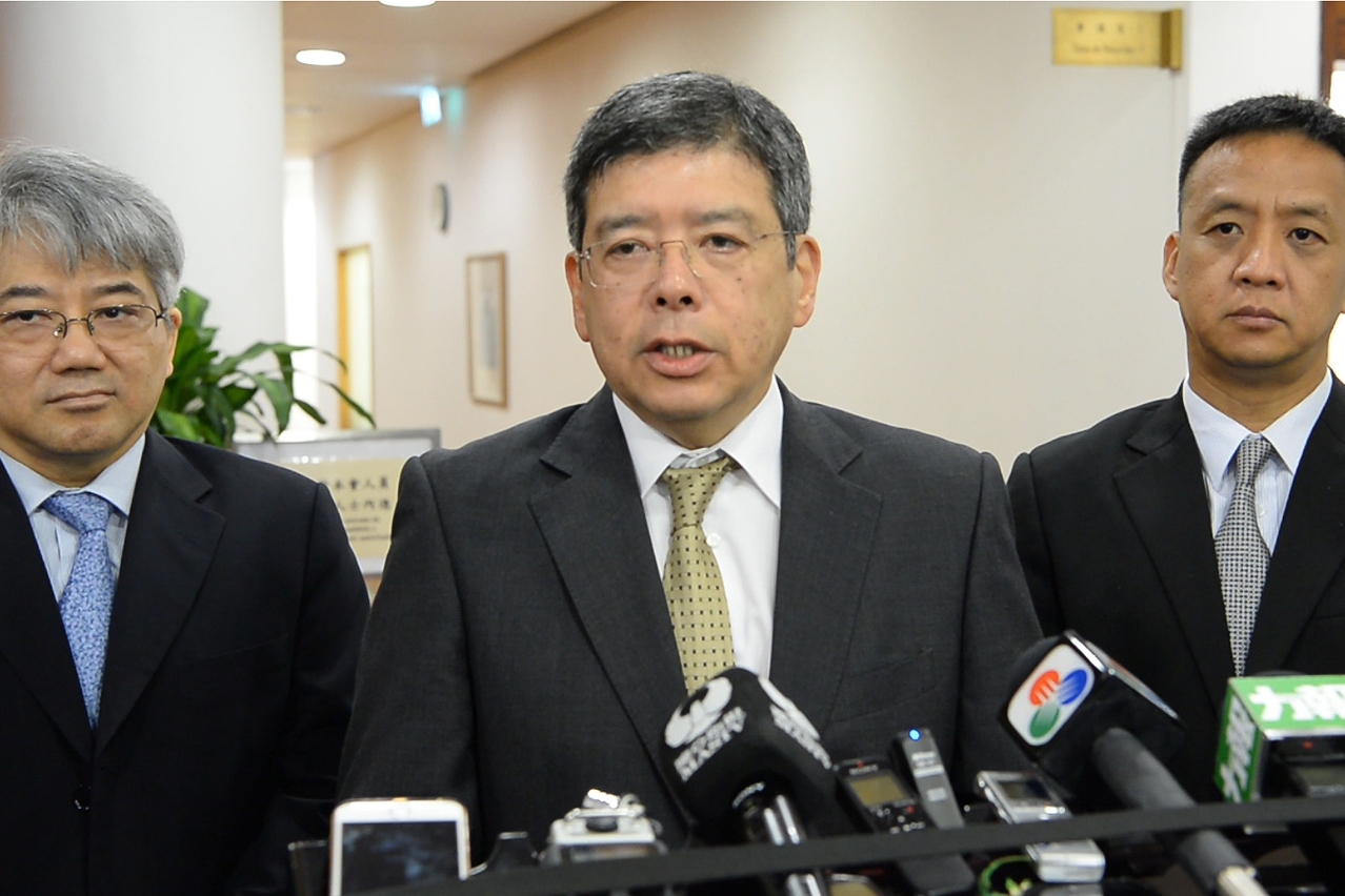 The Secretary for Transport and Public Works, Mr Raimundo do Rosário, speaks to reporters.